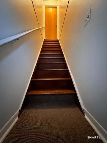 a bathroom with a sink a toilet and bathtub