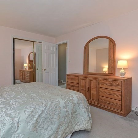 9 Jeffrey Road Canton, MA 02021 - Photo 16 of 38 a bedroom with a bed and a dresser