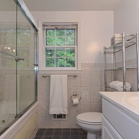 9 Jeffrey Road Canton, MA 02021 - Photo 17 of 38 a bathroom with a sink toilet and shower