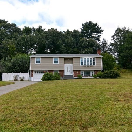 9 Jeffrey Road Canton, MA 02021 - Photo 2 of 38 a house view with a garden space