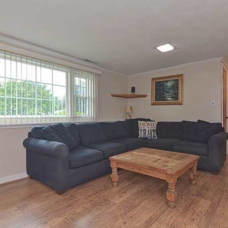 9 Jeffrey Road Canton, MA 02021 - Photo 24 of 38 a living room with furniture and a large window