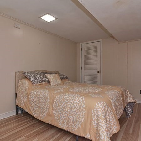 9 Jeffrey Road Canton, MA 02021 - Photo 27 of 38 a bedroom with a bed and a night stand
