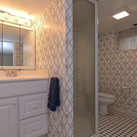 9 Jeffrey Road Canton, MA 02021 - Photo 29 of 38 a bathroom with a sink a toilet and shower