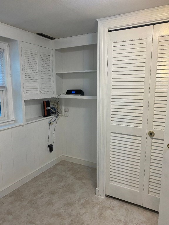 9 Jeffrey Road Canton, MA 02021 - Photo 32 of 38 a view of a room with rack on the wall