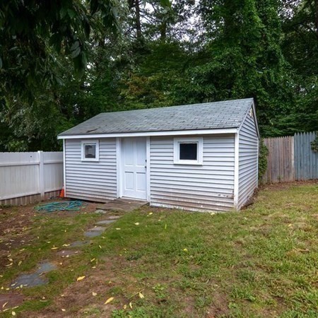 9 Jeffrey Road Canton, MA 02021 - Photo 36 of 38 a view of a house with a yard