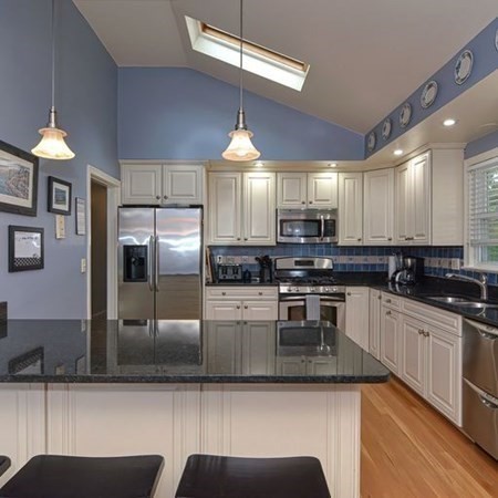9 Jeffrey Road Canton, MA 02021 - Photo 6 of 38 a kitchen with kitchen island a counter space a sink appliances and cabinets