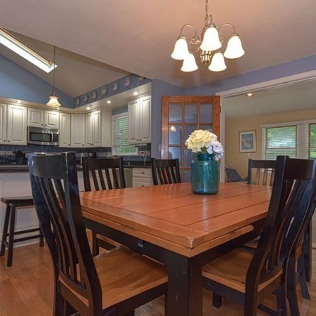9 Jeffrey Road Canton, MA 02021 - Photo 8 of 38 a view of a dining room with furniture and chandelier