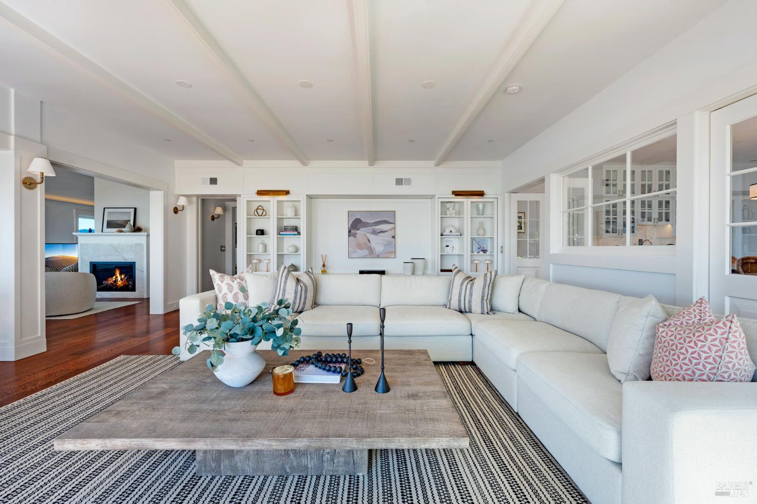 22 Eucalyptus Road Belvedere, CA 94920 - Photo 17 of 64 a living room with furniture and a table