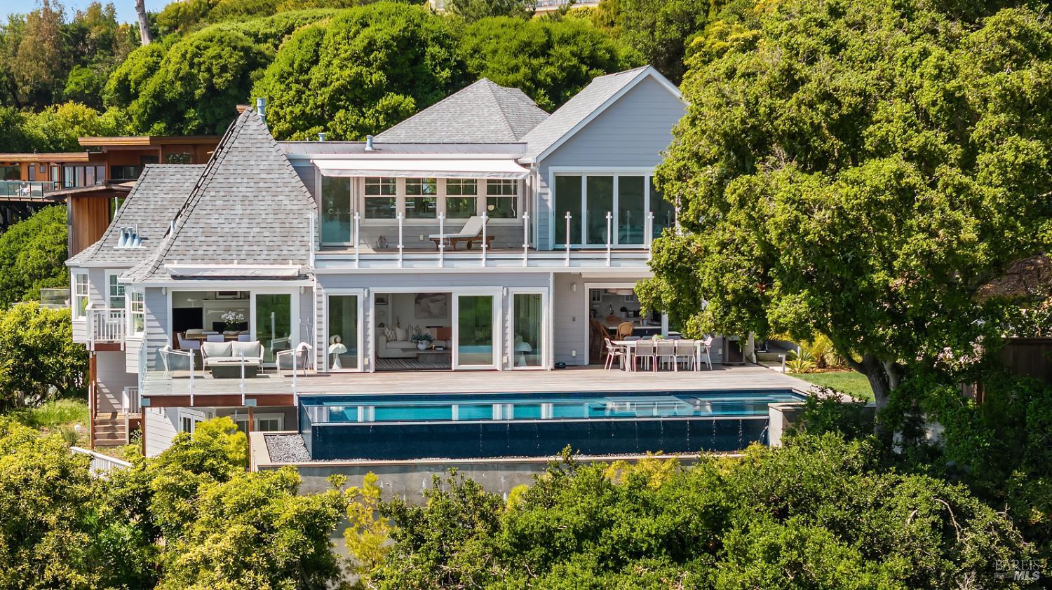 22 Eucalyptus Road Belvedere, CA 94920 - Photo 7 of 64 a house with swimming pool in front of it