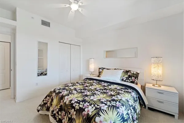 a utility room with sink dryer and washer