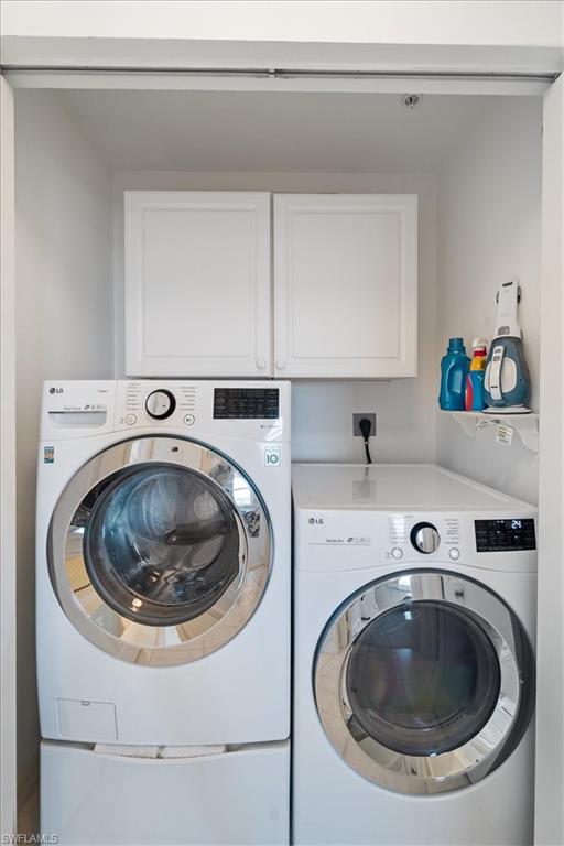 14819 Laguna Drive, Unit 501 Fort Myers, FL 33908 - Photo 35 of 48 a utility room with sink dryer and washer