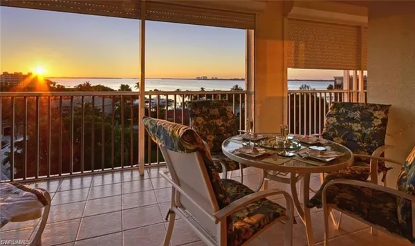 a view of a terrace with a lake view