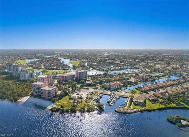 an aerial view of a city with lawn chairs