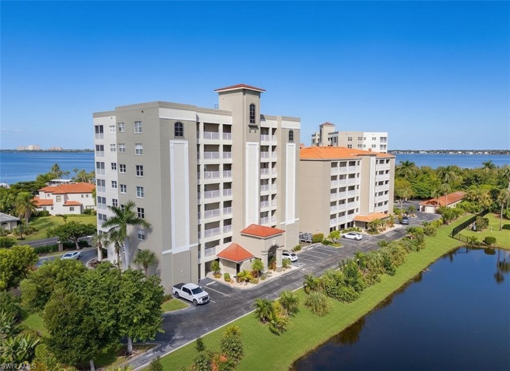 14819 Laguna Drive, Unit 501 Fort Myers, FL 33908 - Photo 6 of 48 aerial view of a city with tall buildings