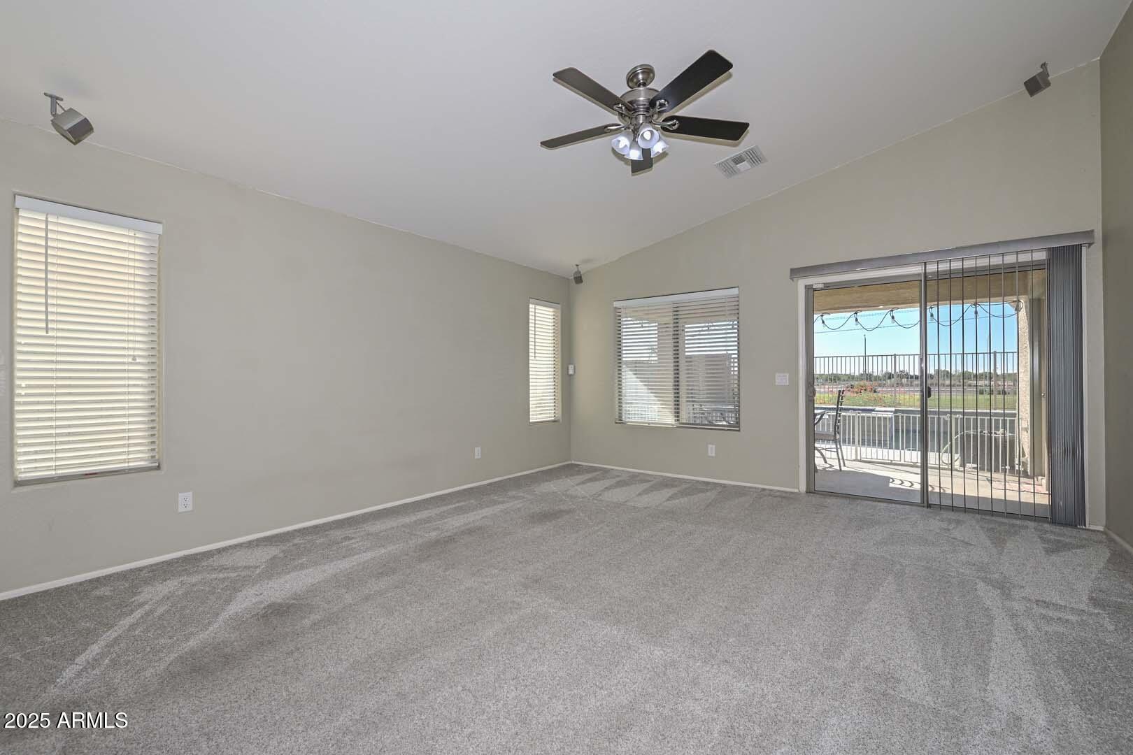 17687 West Charter Oak Road Surprise, AZ 85388 - Photo 16 of 52 a view of an empty room with a window