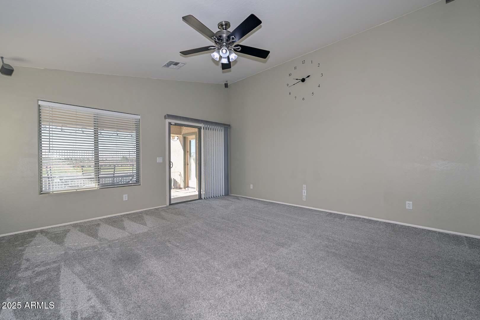 17687 West Charter Oak Road Surprise, AZ 85388 - Photo 17 of 52 a view of an empty room with a window