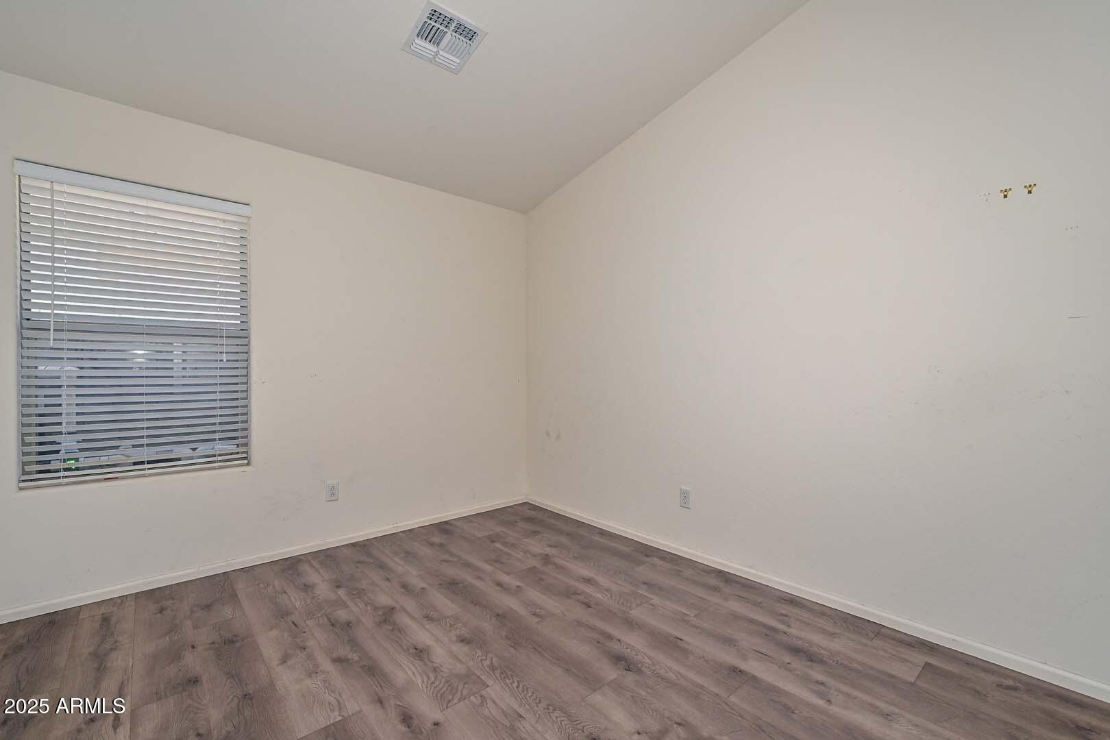 17687 West Charter Oak Road Surprise, AZ 85388 - Photo 19 of 52 a view of a room that has a window in it