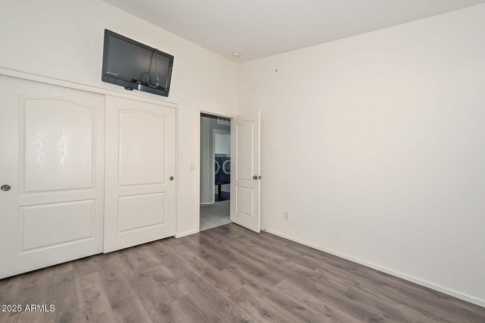 17687 West Charter Oak Road Surprise, AZ 85388 - Photo 20 of 52 a view of a livingroom with wooden floor
