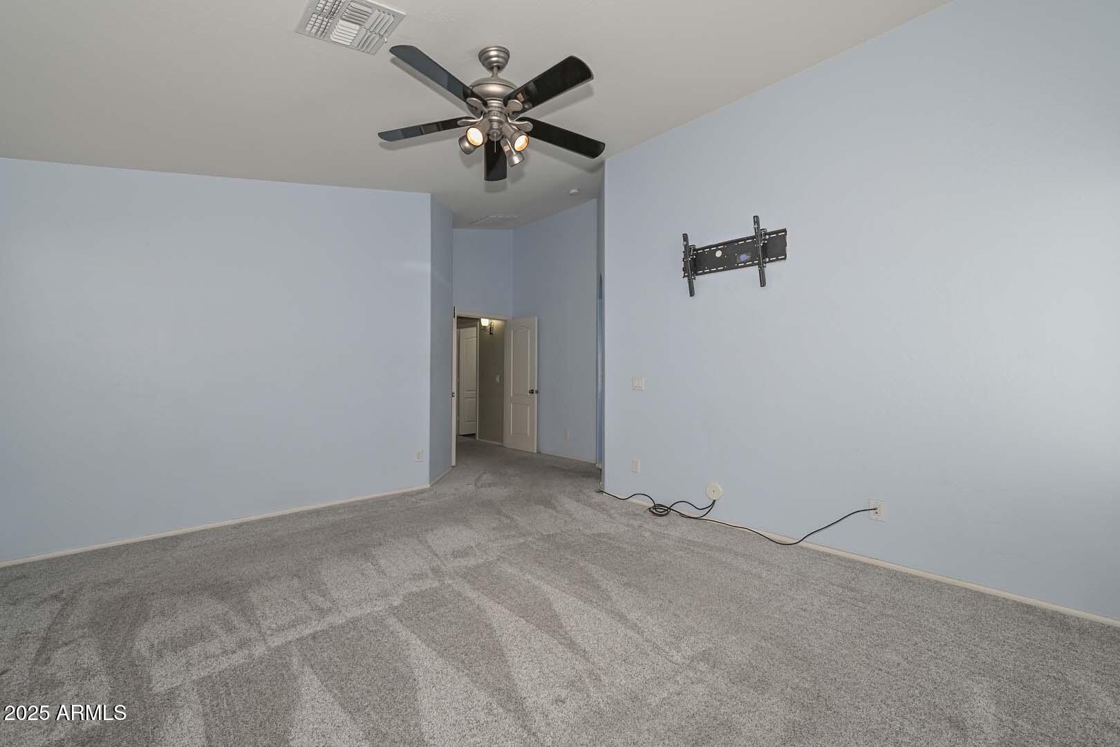 17687 West Charter Oak Road Surprise, AZ 85388 - Photo 27 of 52 wooden floor in an empty room