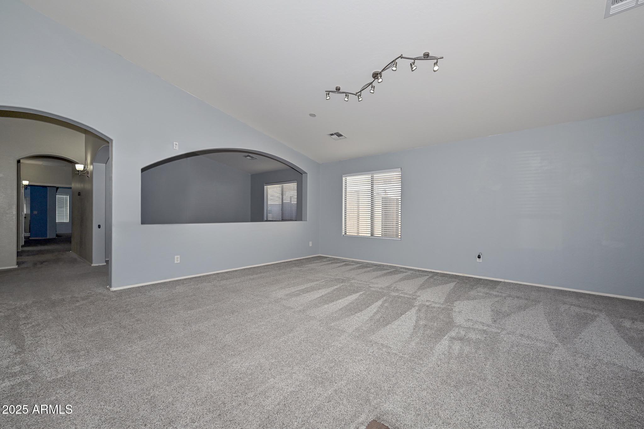 17687 West Charter Oak Road Surprise, AZ 85388 - Photo 7 of 52 a view of empty room with window