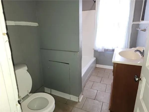 a bathroom with a sink and a toilet