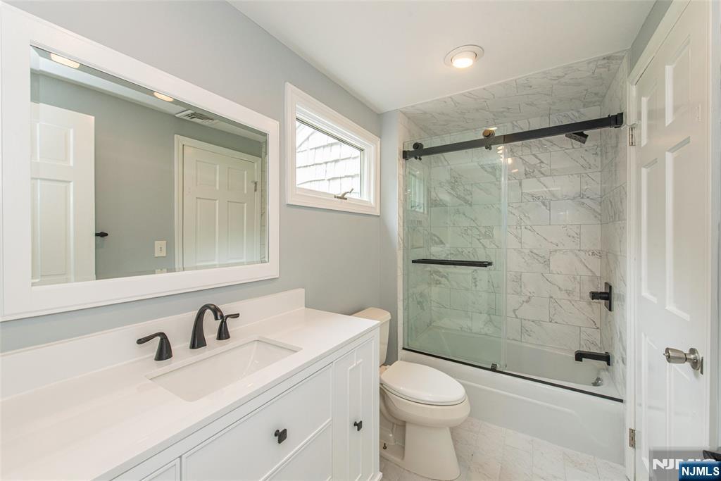 163 Sand Spring Road Morristown, NJ 07960 - Photo 21 of 39 a bathroom with a sink toilet and shower