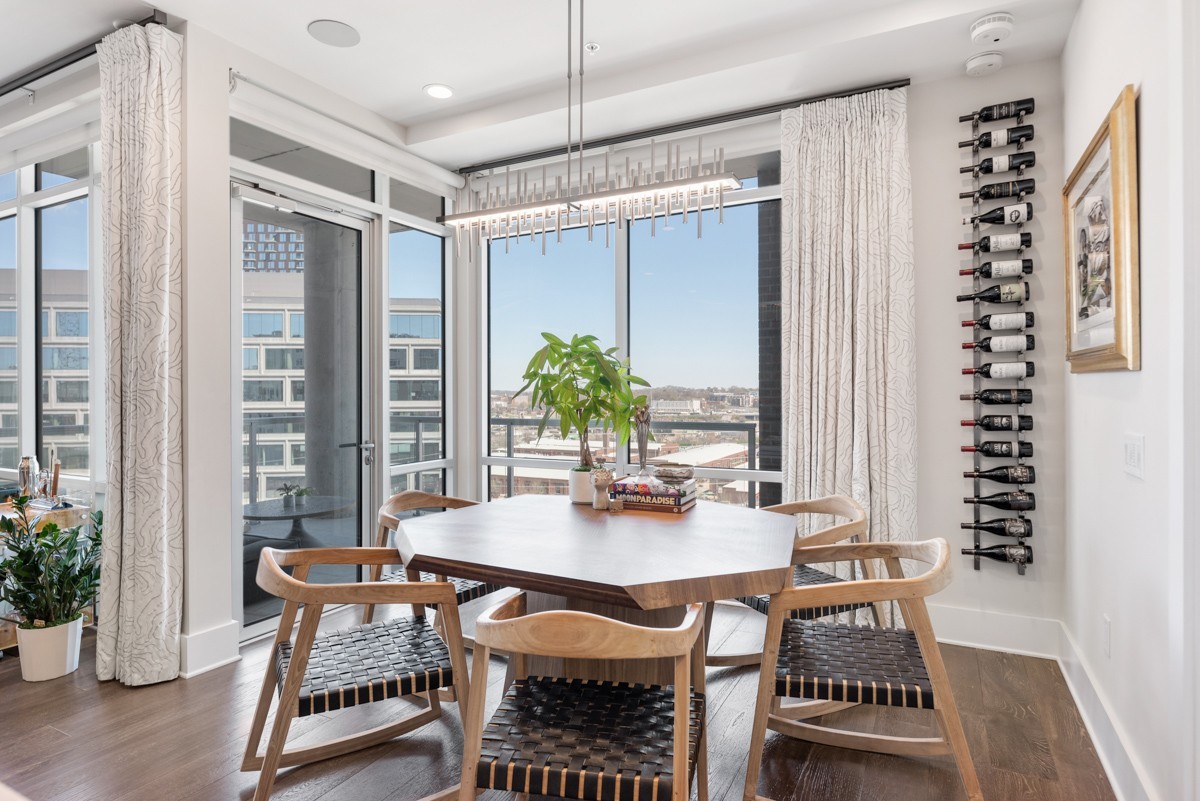 20 Rutledge Street, Unit 407 Nashville, TN 37210 - Photo 18 of 56 a dining room with furniture window and wooden floor