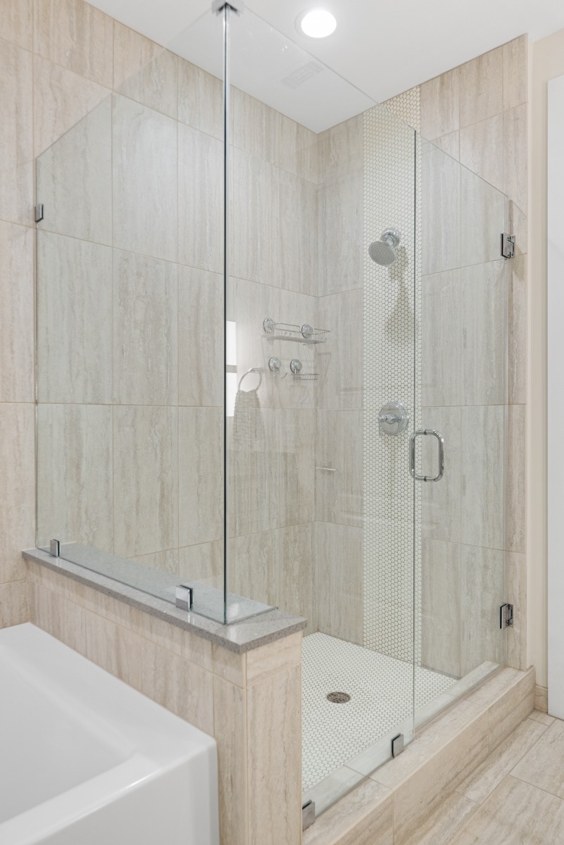 20 Rutledge Street, Unit 407 Nashville, TN 37210 - Photo 24 of 56 a bathroom with a shower and a sink