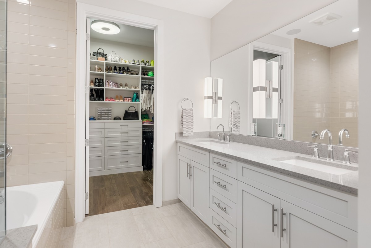 20 Rutledge Street, Unit 407 Nashville, TN 37210 - Photo 28 of 56 a spacious bathroom with double vanity and a bathtub
