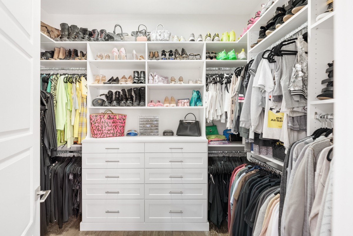 20 Rutledge Street, Unit 407 Nashville, TN 37210 - Photo 29 of 56 a view of walk in closet with clothes and shoes