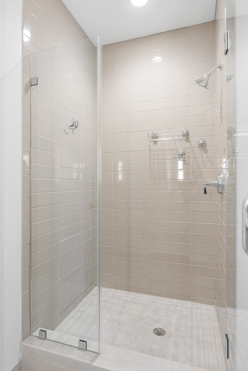 20 Rutledge Street, Unit 407 Nashville, TN 37210 - Photo 34 of 56 a bathroom with a shower