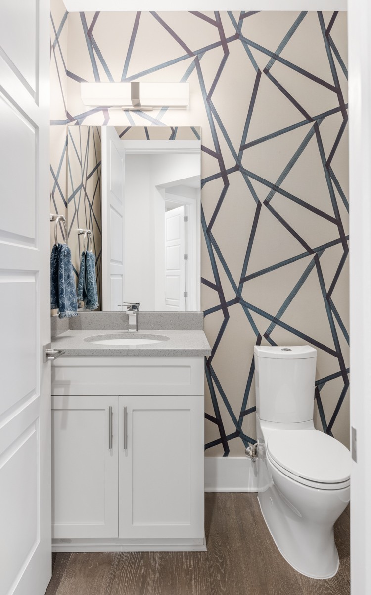 20 Rutledge Street, Unit 407 Nashville, TN 37210 - Photo 37 of 56 a bathroom with a sink a toilet and a mirror