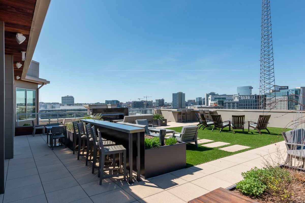 20 Rutledge Street, Unit 407 Nashville, TN 37210 - Photo 42 of 56 a view of a terrace with sitting area