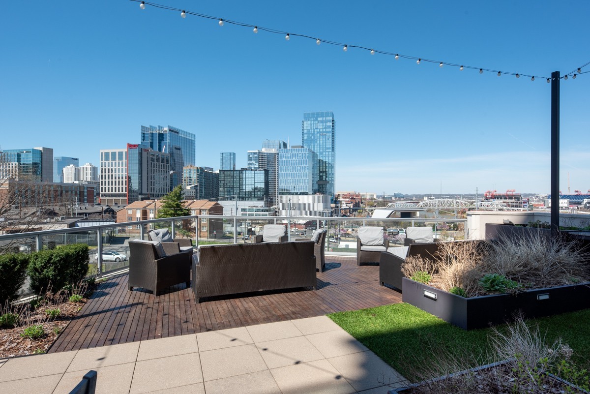 20 Rutledge Street, Unit 407 Nashville, TN 37210 - Photo 43 of 56 a view of a terrace with sitting area