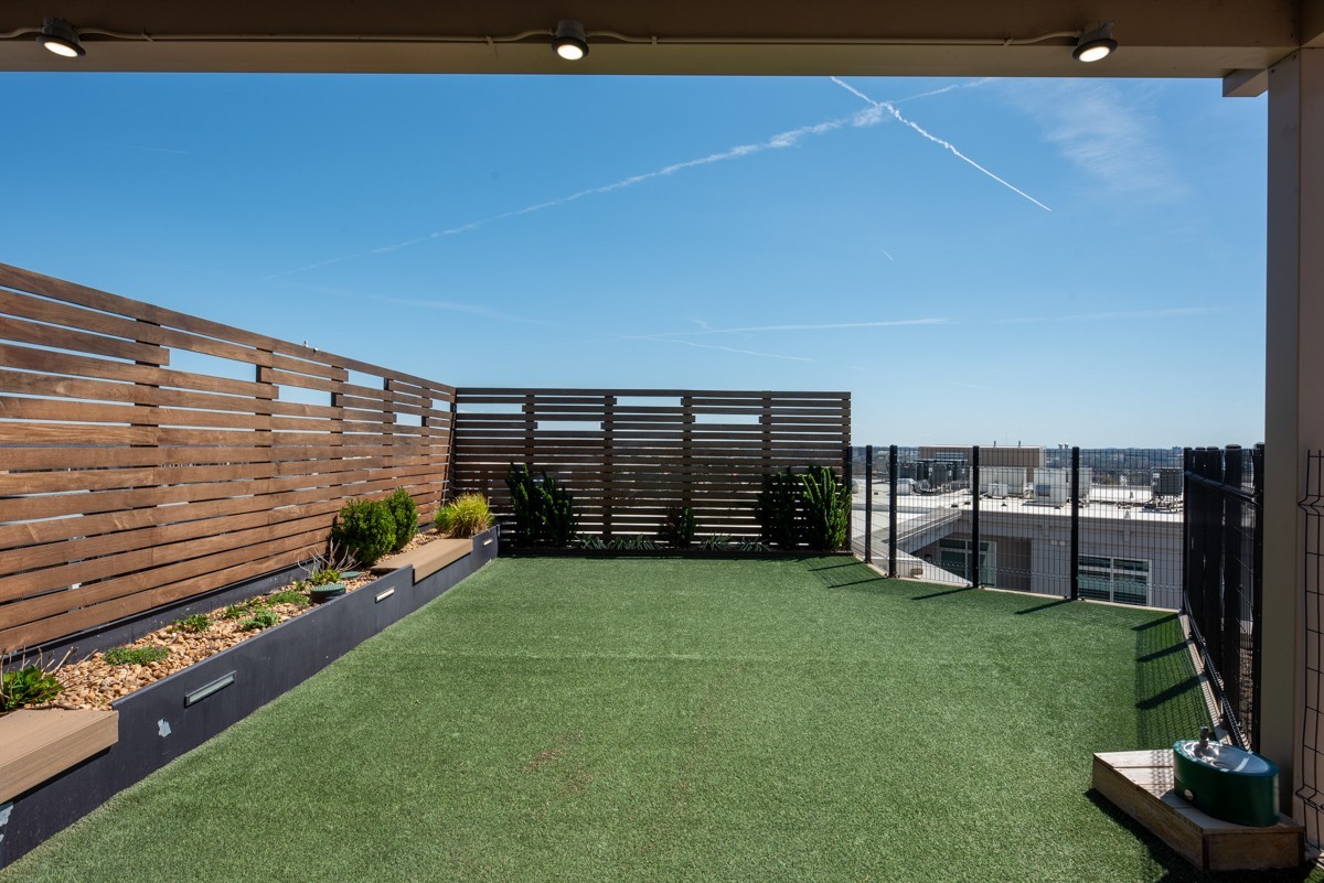 20 Rutledge Street, Unit 407 Nashville, TN 37210 - Photo 52 of 56 a view of a backyard with chairs