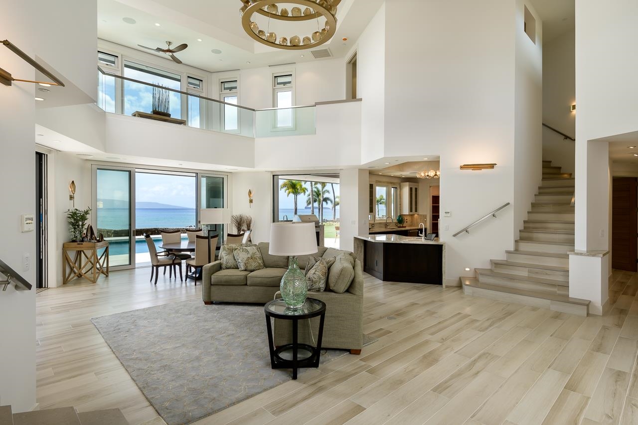 7595 Makena Road Kihei, HI 96753 - Photo 2 of 39 a living room with furniture and wooden floor