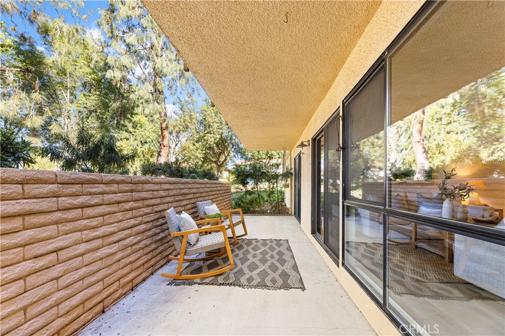841 Ronda Sevilla, Unit B Laguna Woods, CA 92637 - Photo 26 of 37 a view of a bench in a balcony