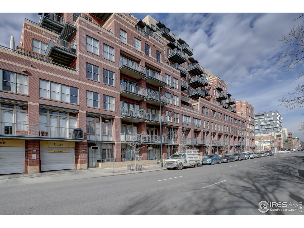 1499 Blake Street, Unit 6G Denver, CO 80202 - Photo 28 of 37 a large building with a street