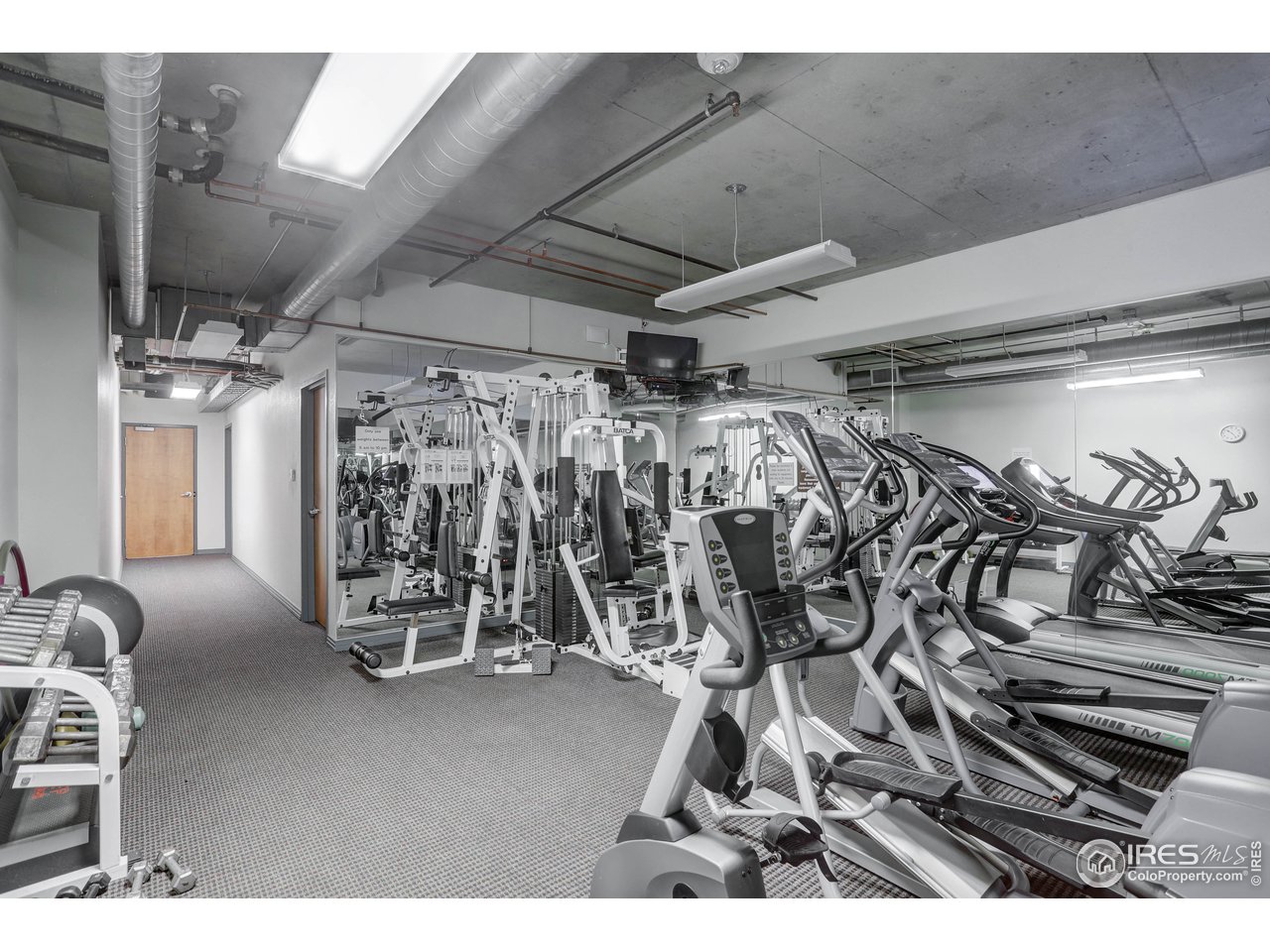 1499 Blake Street, Unit 6G Denver, CO 80202 - Photo 34 of 37 a view of a room with gym equipment