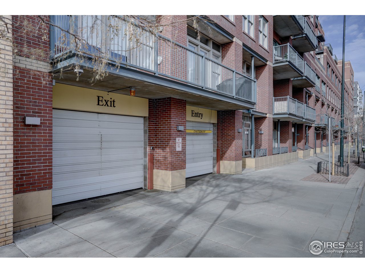 1499 Blake Street, Unit 6G Denver, CO 80202 - Photo 35 of 37 a view of a building with retail shops
