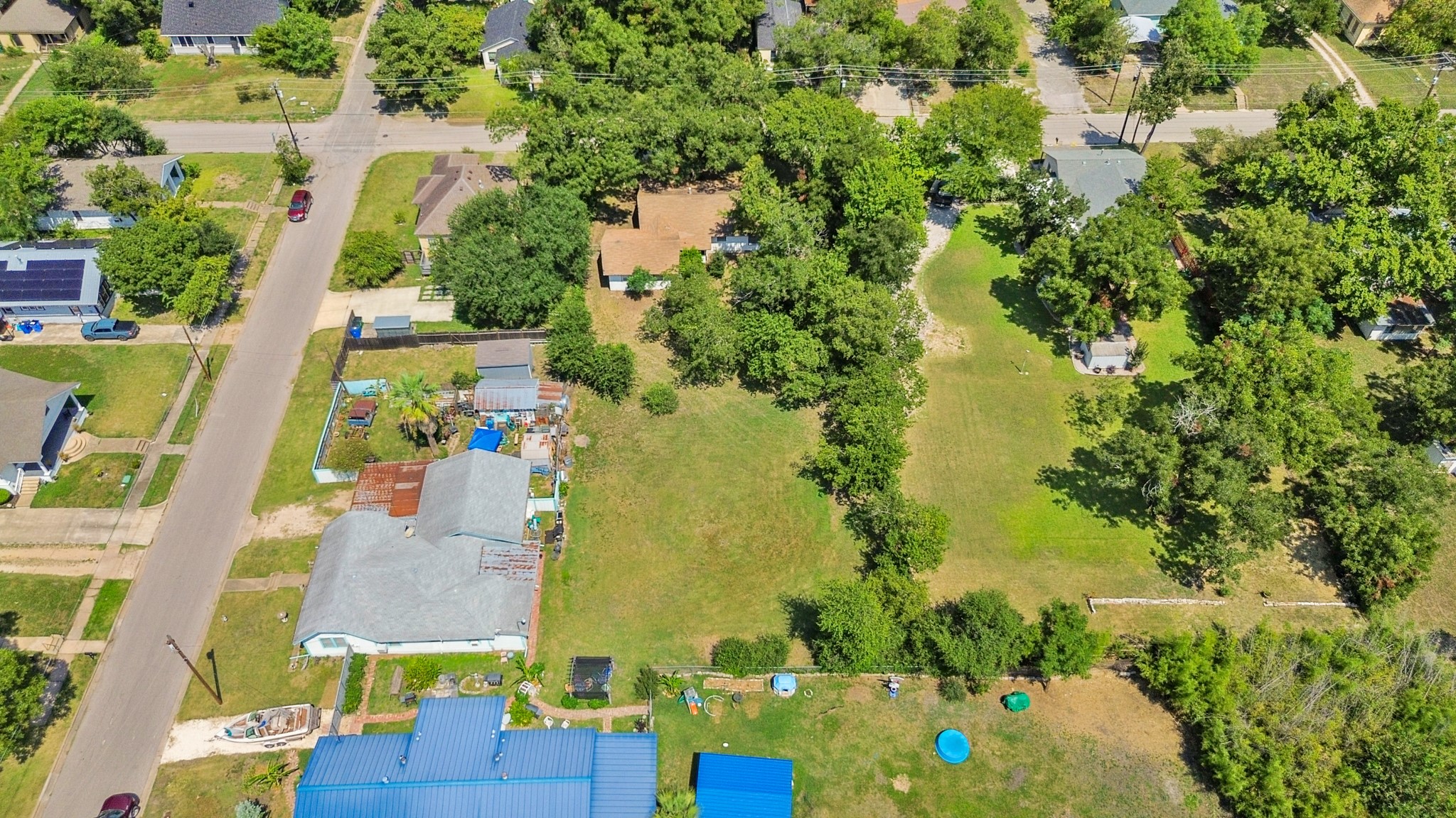 1007 Kimbro Street Taylor, TX 76574 - Photo 29 of 32 an aerial view of residential houses with outdoor space