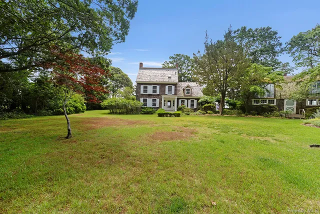 a view of a house with a park