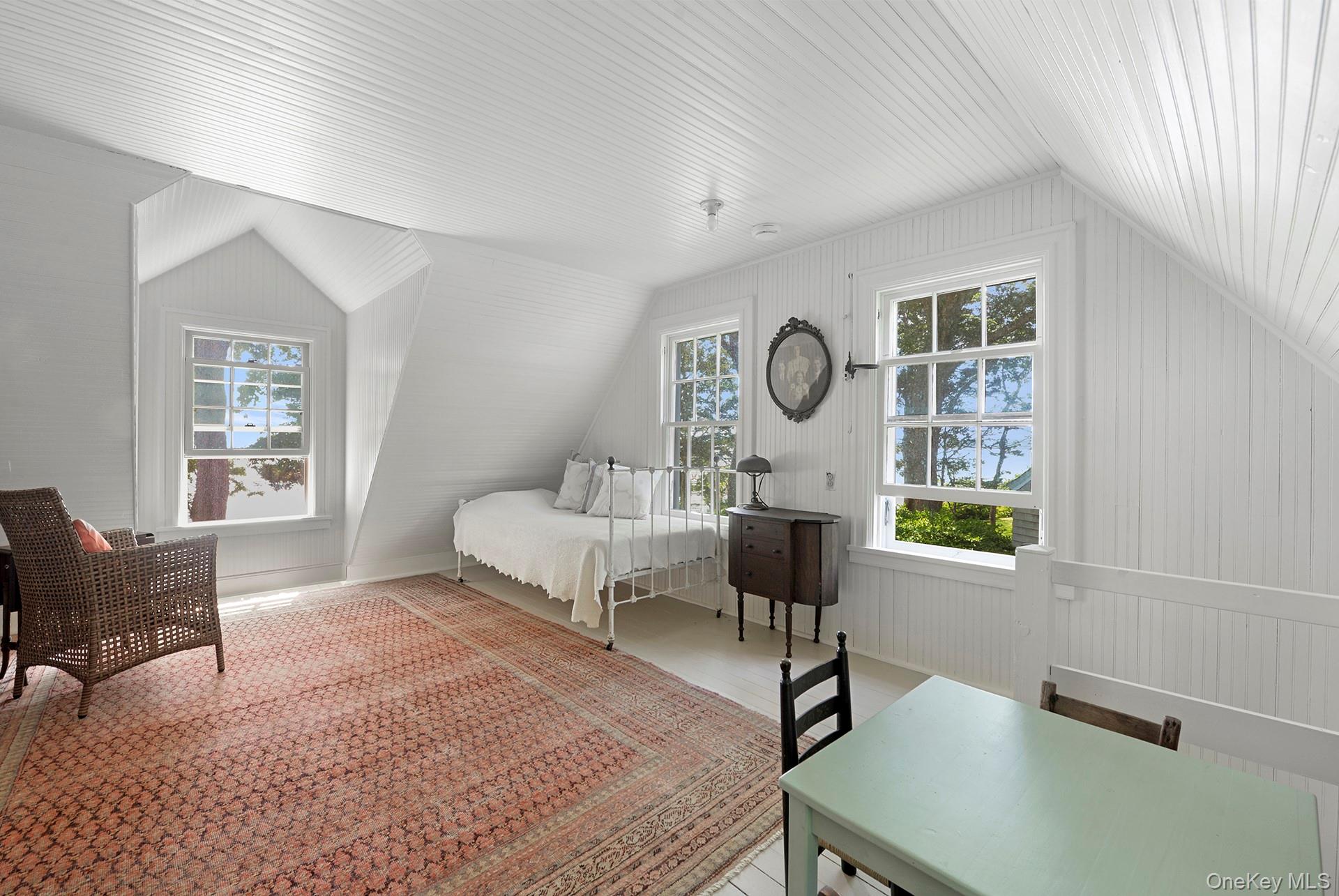 Undisclosed Address Peconic, NY 11958 - Photo 19 of 24 a living room with furniture and a window