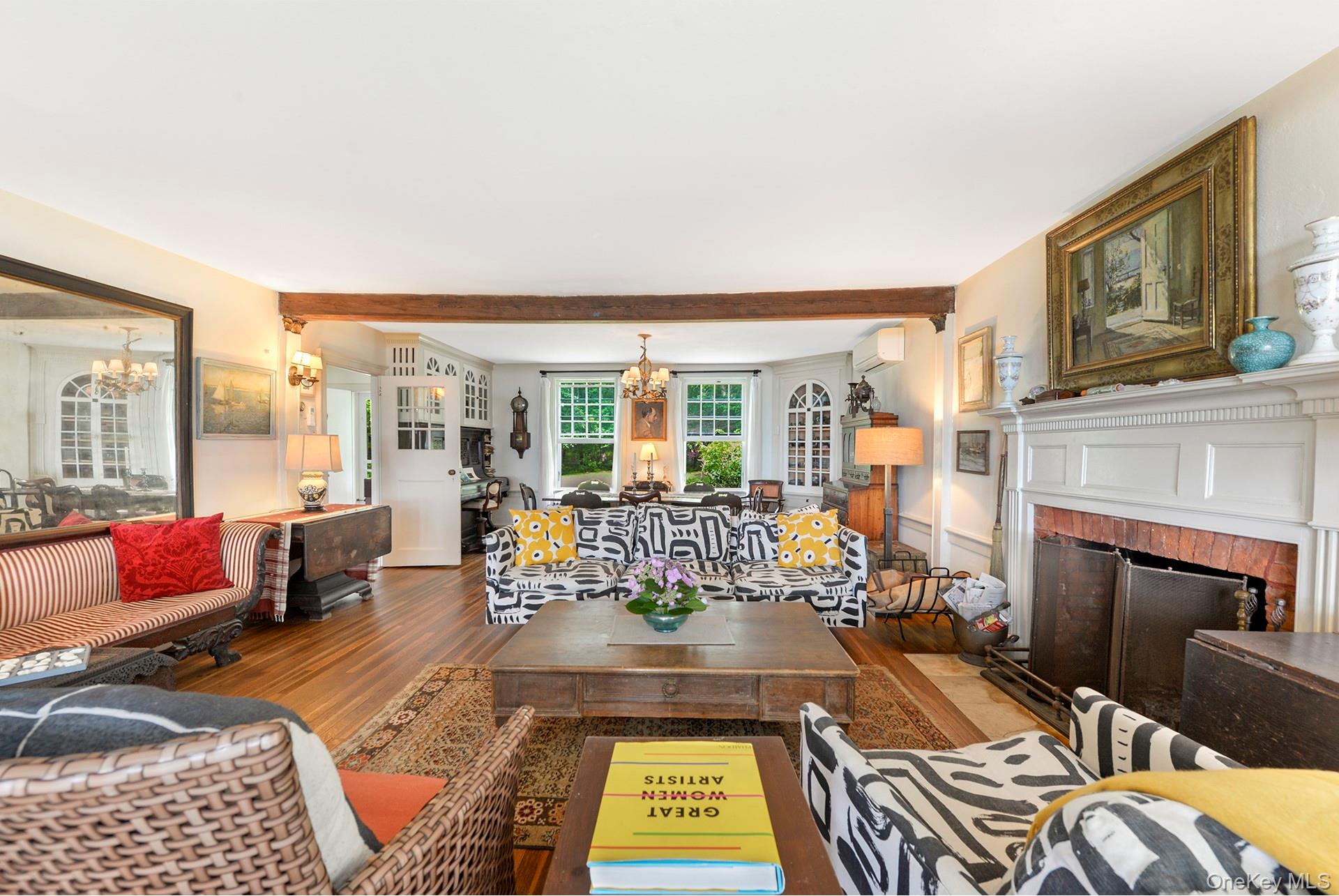 Undisclosed Address Peconic, NY 11958 - Photo 2 of 24 a living room with furniture and a fireplace