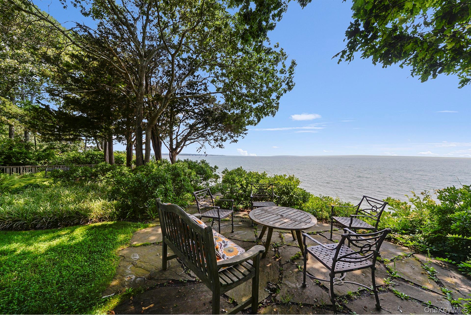 Undisclosed Address Peconic, NY 11958 - Photo 22 of 24 a view of a chairs and table in patio