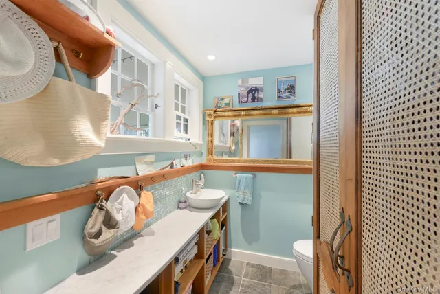a utility room with a sink a washer and dryer