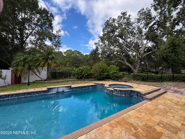 a kitchen with large window
