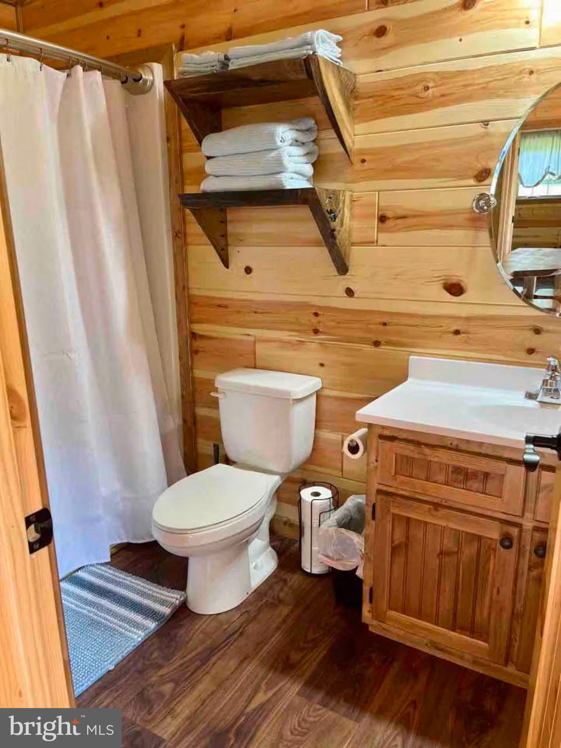 184 Skiles- Pitsenbarger Road Franklin, WV 26807 - Photo 21 of 39 Cozy wooden bathroom retreat.