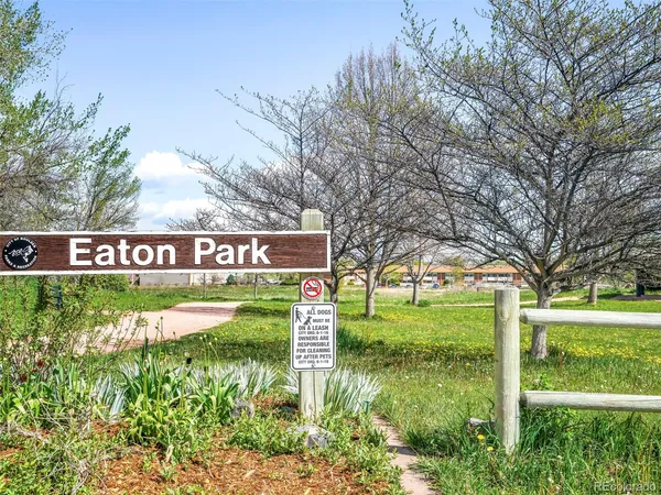 a view of a park with welcome board