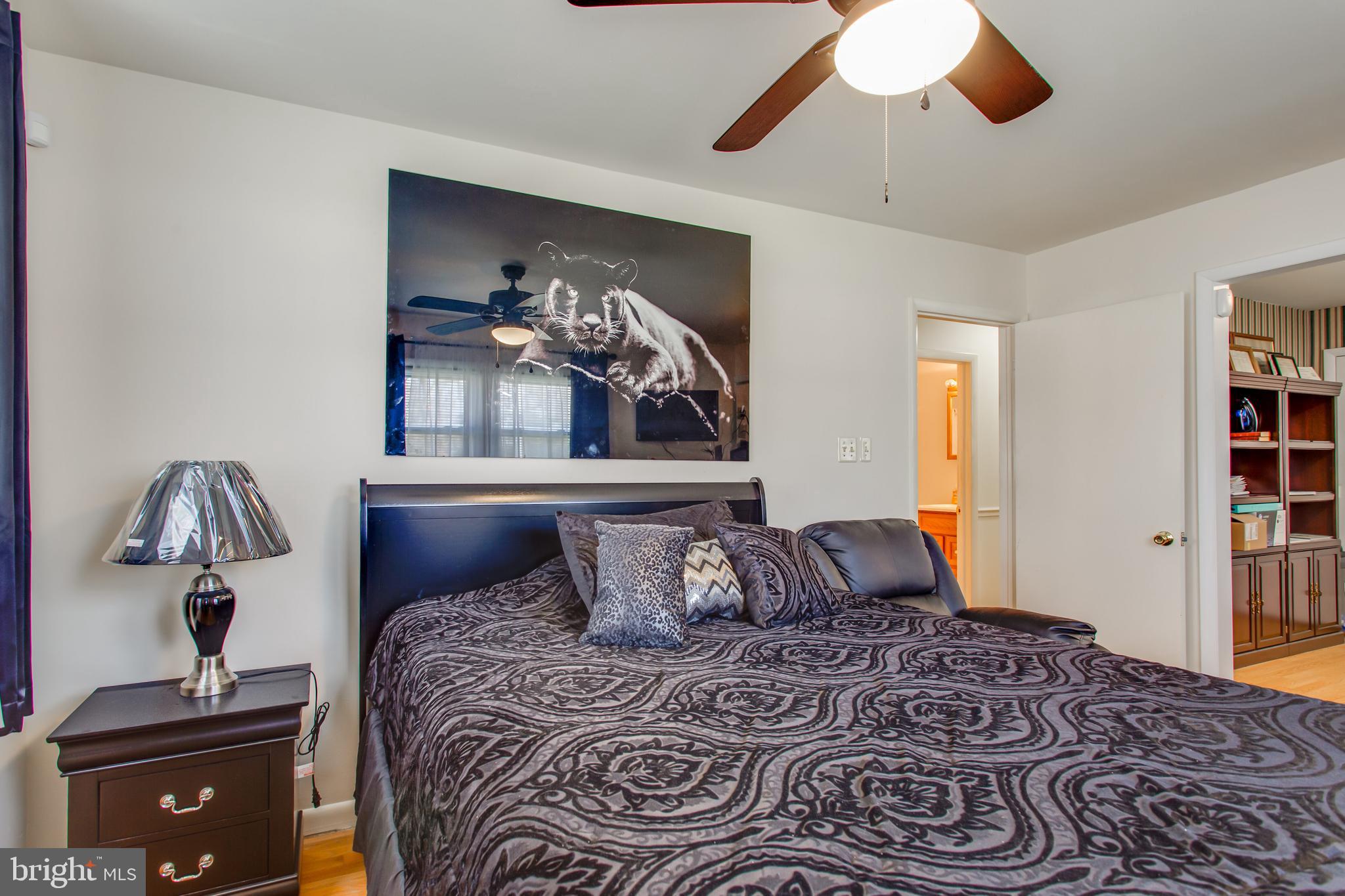 2784 Moran Drive Waldorf, MD 20601 - Photo 12 of 65 a bedroom with a bed and wooden floor